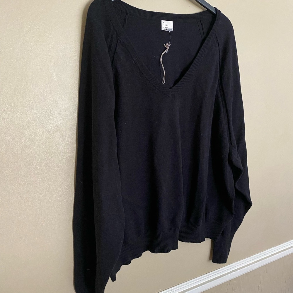 A new day sweater